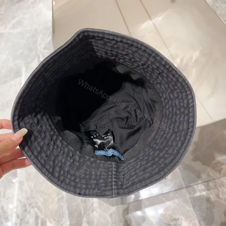 View 4 of Dark-Wash Prada Milano Bucket Hat: Subtle Luxe Edge