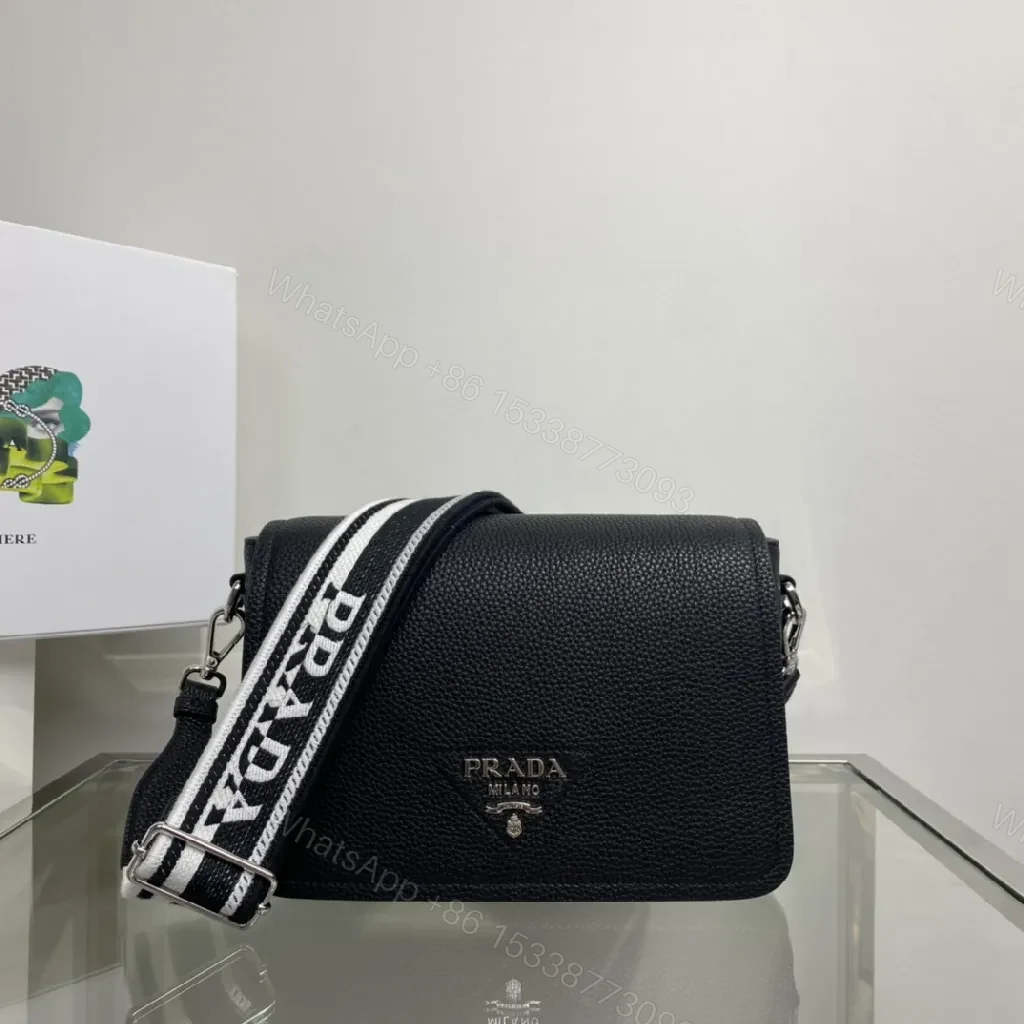 Black Pebble-Grain Crossbody: Luxe Slim with Signature Hardware — view 1