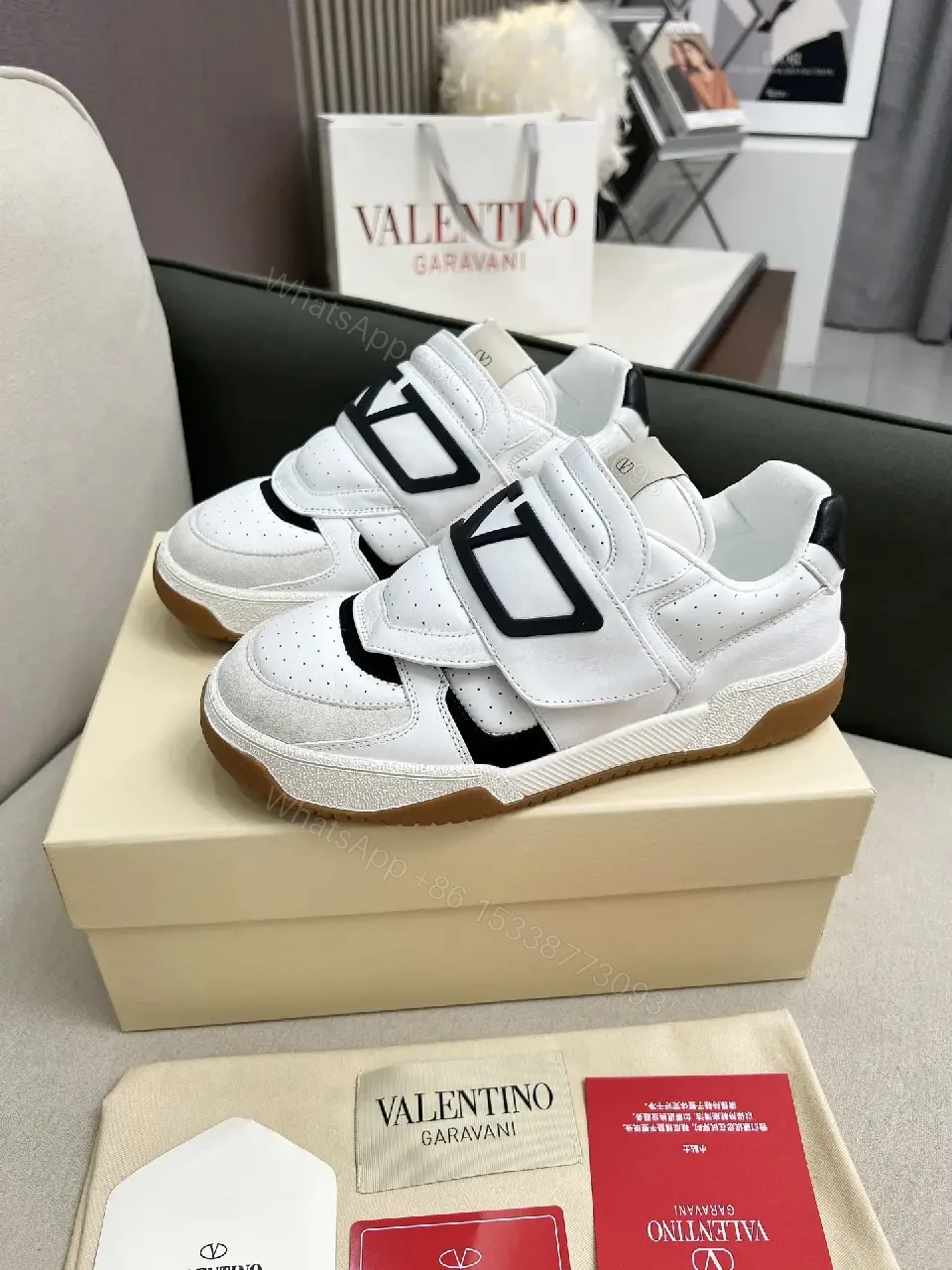 View 3 of White Leather High-Top Sneakers with Geometric Hardware