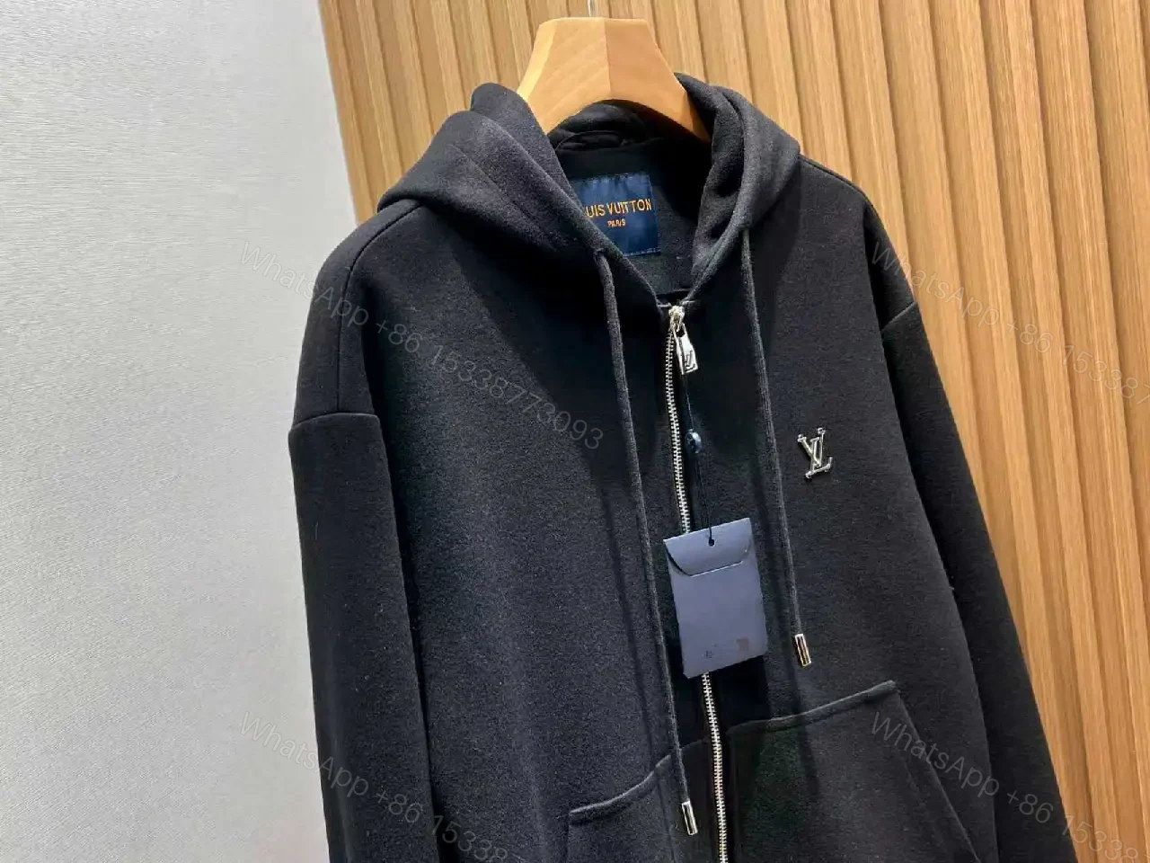 View 6 of Cozy Black Knit Zip Hoodie with Subtle Emblem Embellishment