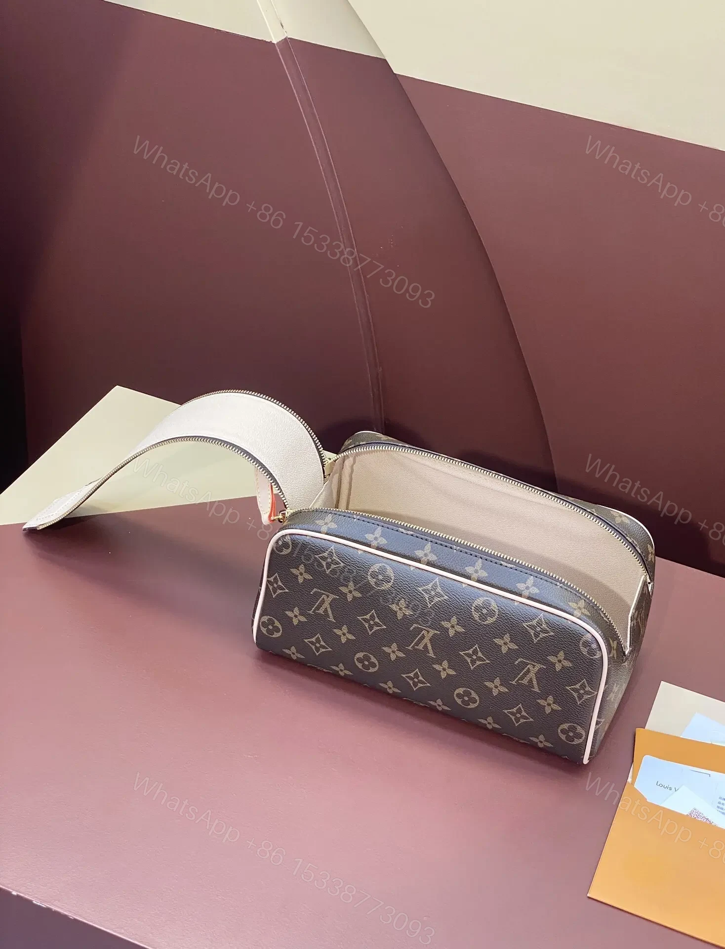 View 4 of Louis Vuitton Dopp Kit Toilet Pouch in Monogram Canvas