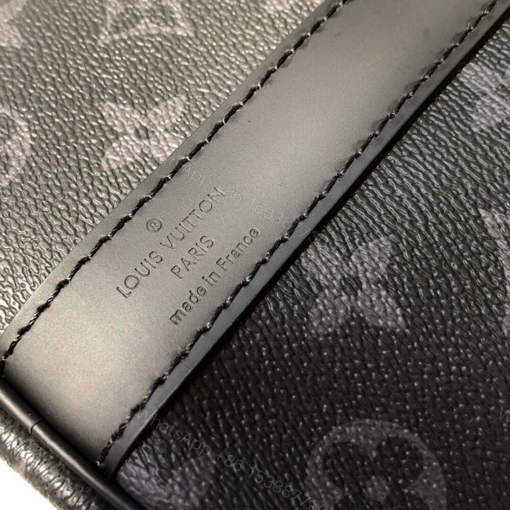 View 10 of Louis Vuitton Keepall Bandouliere 55 Monogram Eclipse Canvas 55cm LV M40605