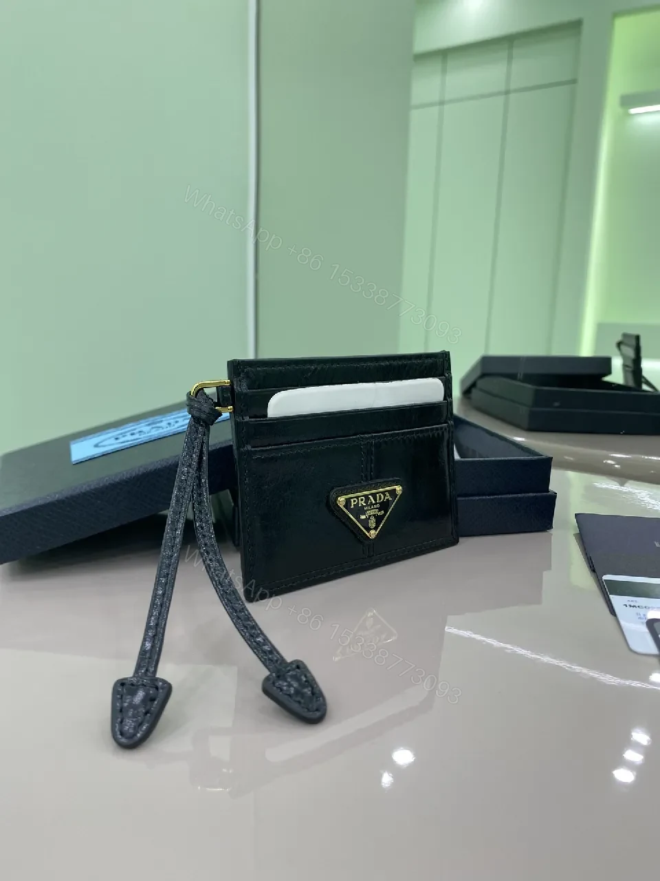 View 5 of Black Leather Compact Cardholder, Gold Logo, Minimalist, Central Bill Compartment, Cardholder