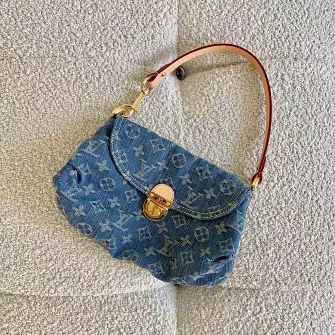View 2 of Louis Vuitton Pleaty Handbag Monogram Denim Blue 26Cm M95050