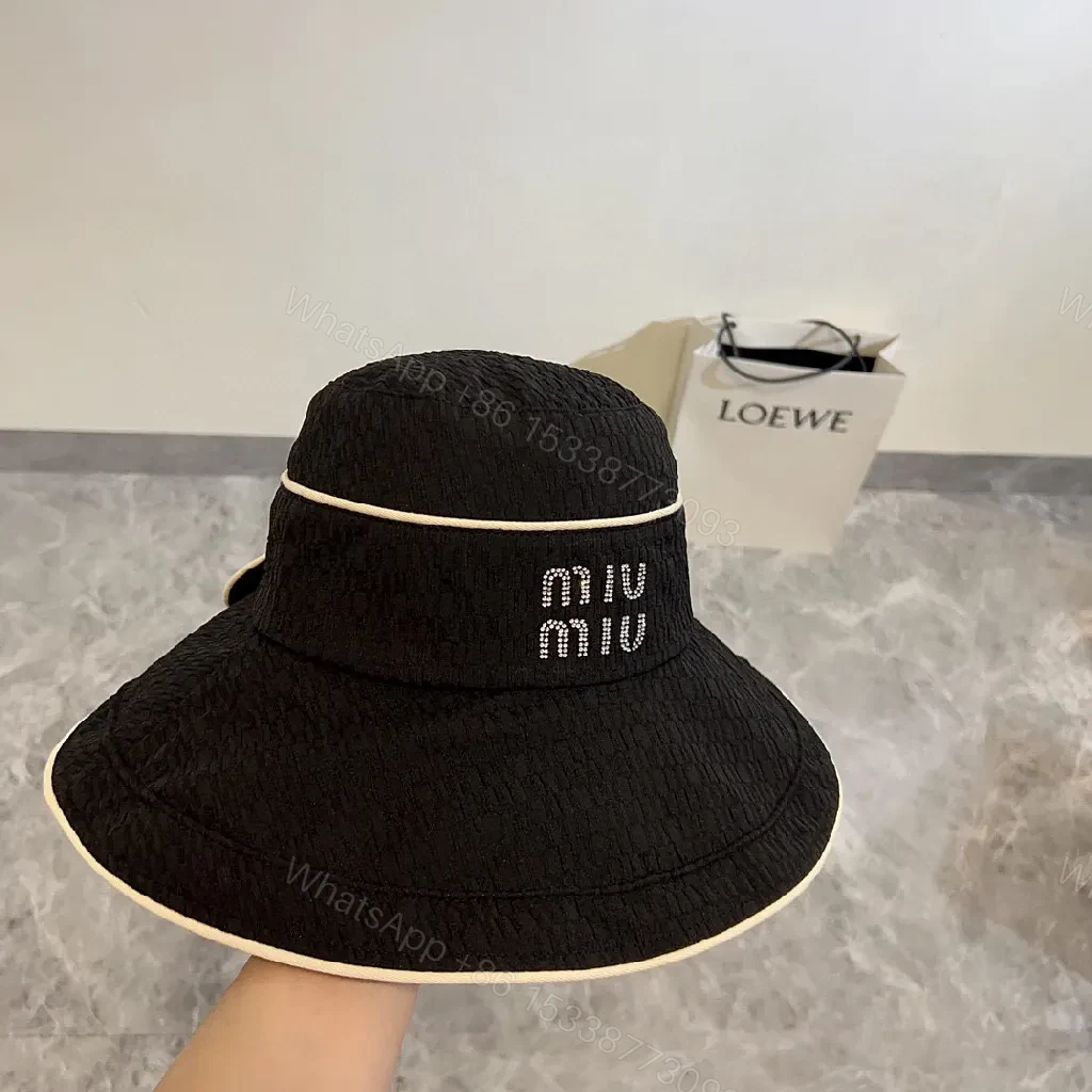 View 2 of Structured Black Straw Bucket Hat — Crystal Logo Accent, All-Season Style