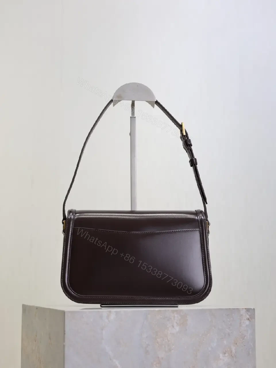 View 4 of Dark Leather Compact Crossbody: Minimalist Luxury Bag
