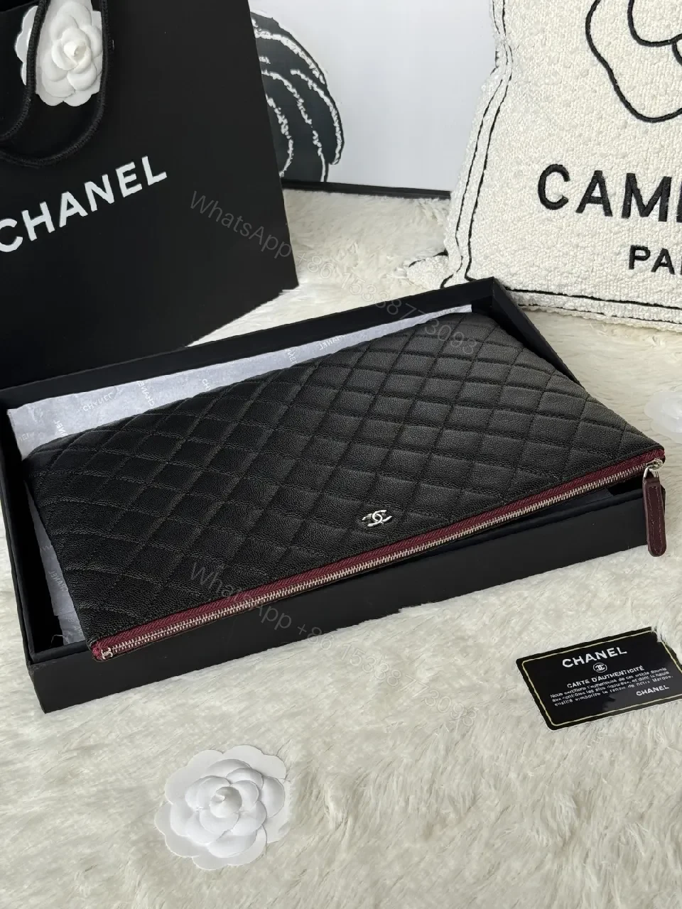View 9 of Compact Black Quilted Leather Clutch with Silver Logo