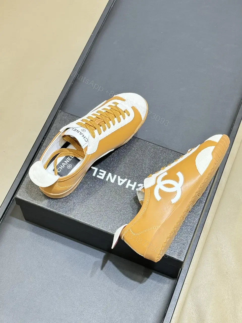 View 3 of Tan Leather & Ivory High-Top Sneakers with Signature Textures