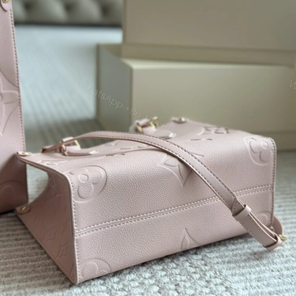 View 3 of Louis Vuitton Onthego PM Monogram Empreinte Pink Opale 25Cm M47135