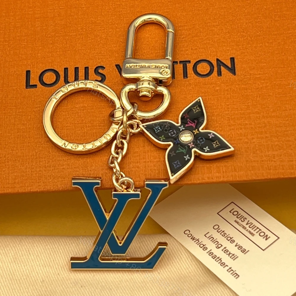 View 3 of Louis Vuitton Lv Logo Bag Charms Key Holder