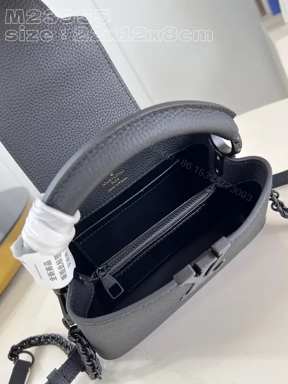 View 6 of Compact Pebble-Leather Crossbody: Monogram-Accent Bag