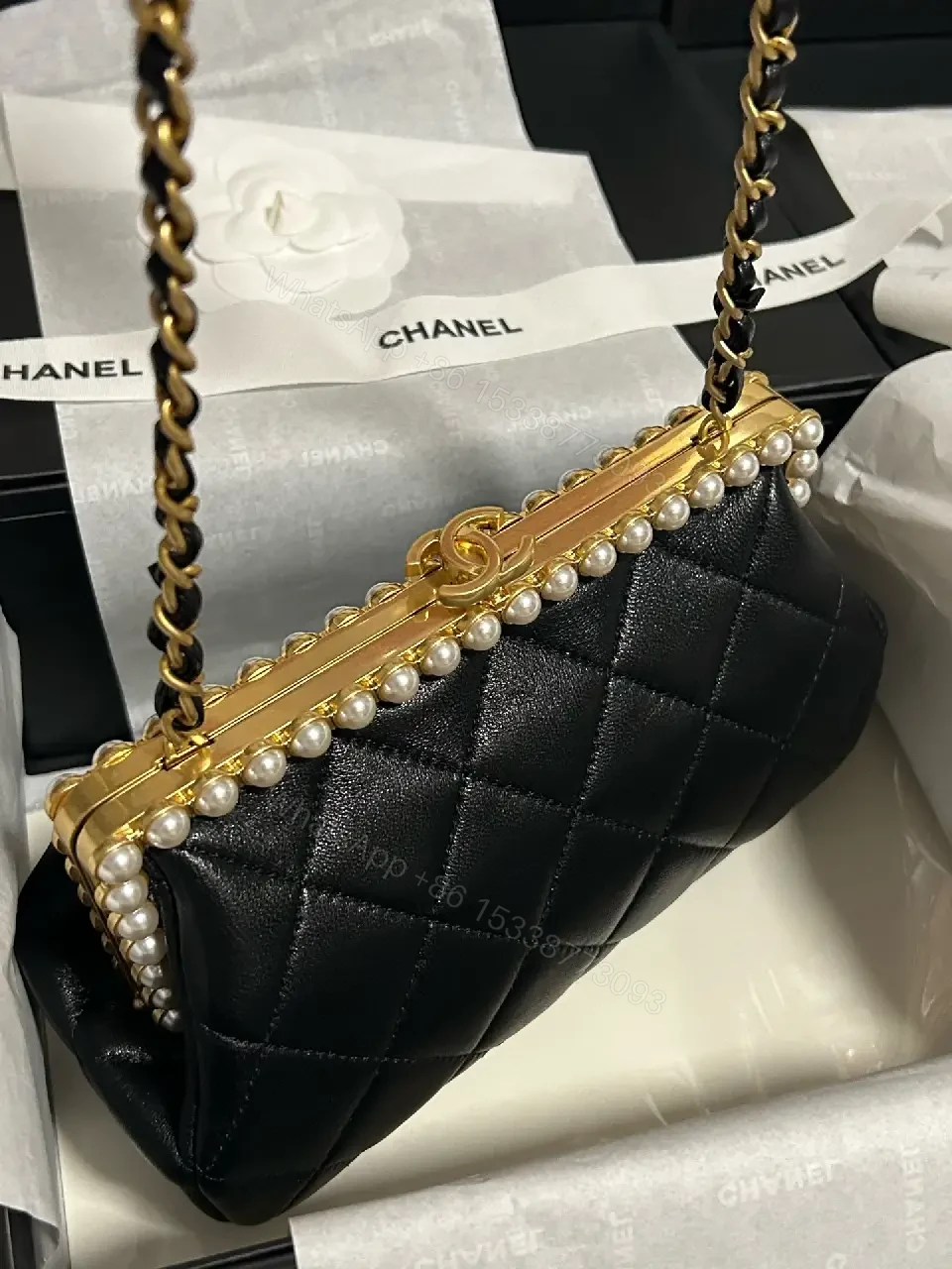 View 3 of Black Quilted Leather Clutch with Pearl Trim, Gold Frame, Elegant