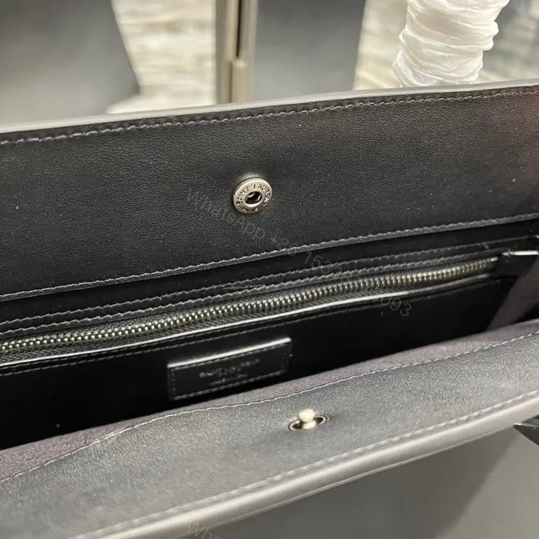 View 8 of Structured Minimalism: Leather Tote with Embossed Branding (60)