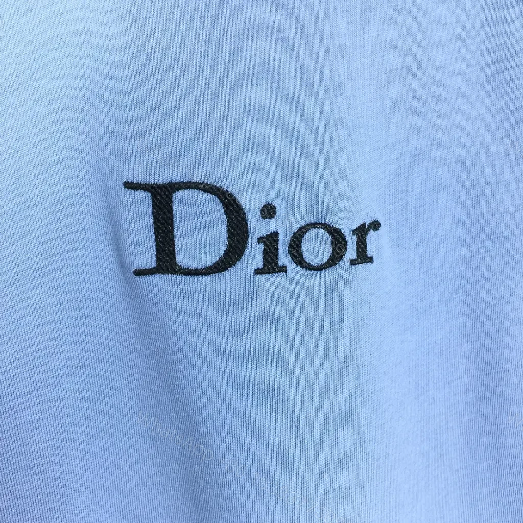 View 4 of Cozy Blue Luxe Tee: Lightweight Cotton-Blend, Subtle Logo, Modern-Casual