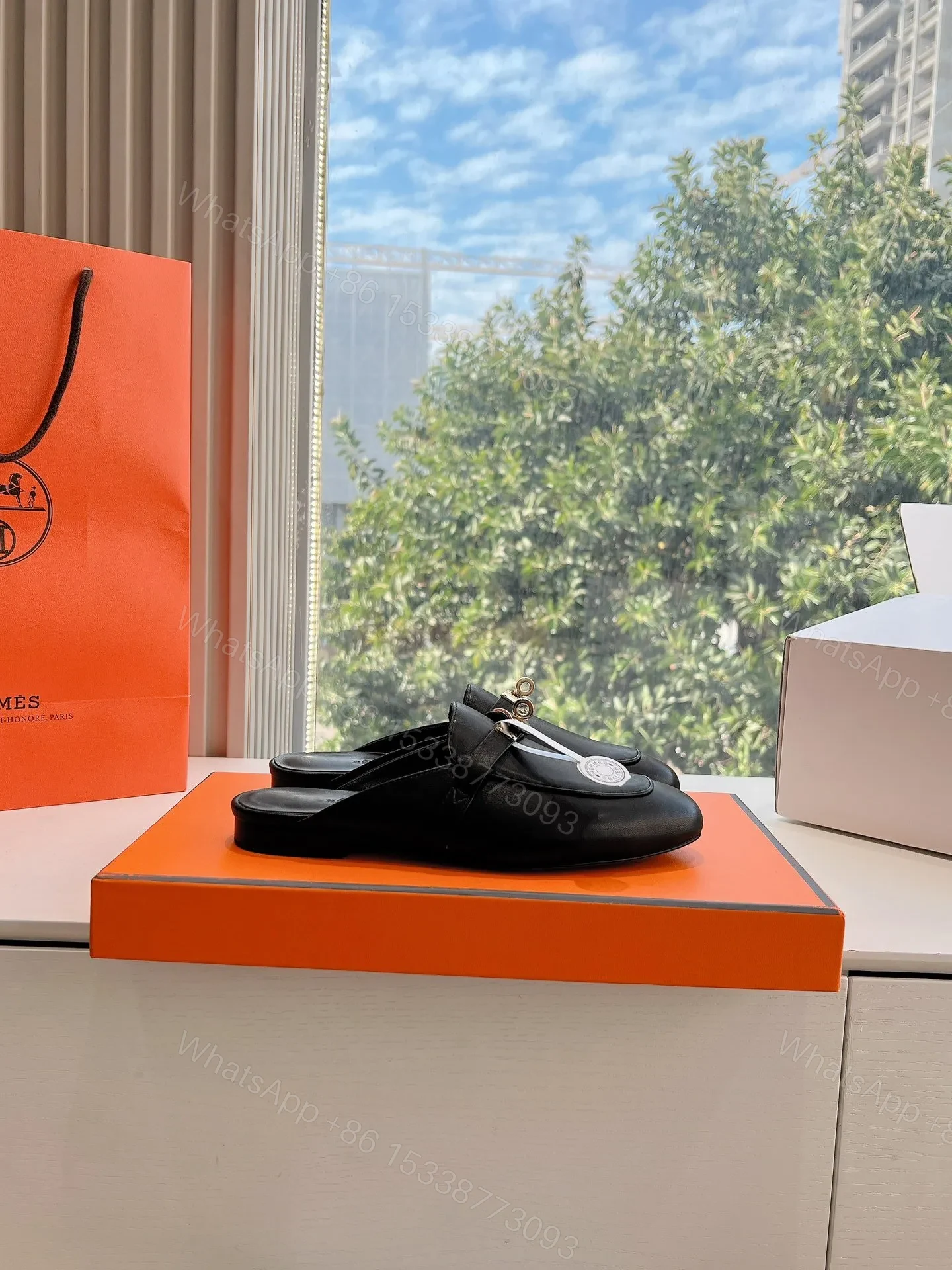 View 2 of Hermes Women Black Leather Mules