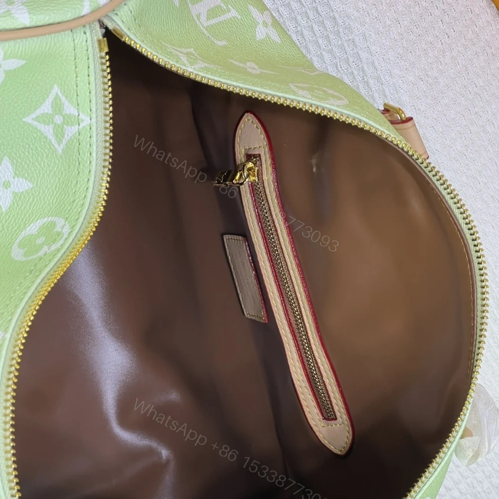 View 7 of Louis Vuitton Speedy P9 Bandoulière 25 Mint 40Cm