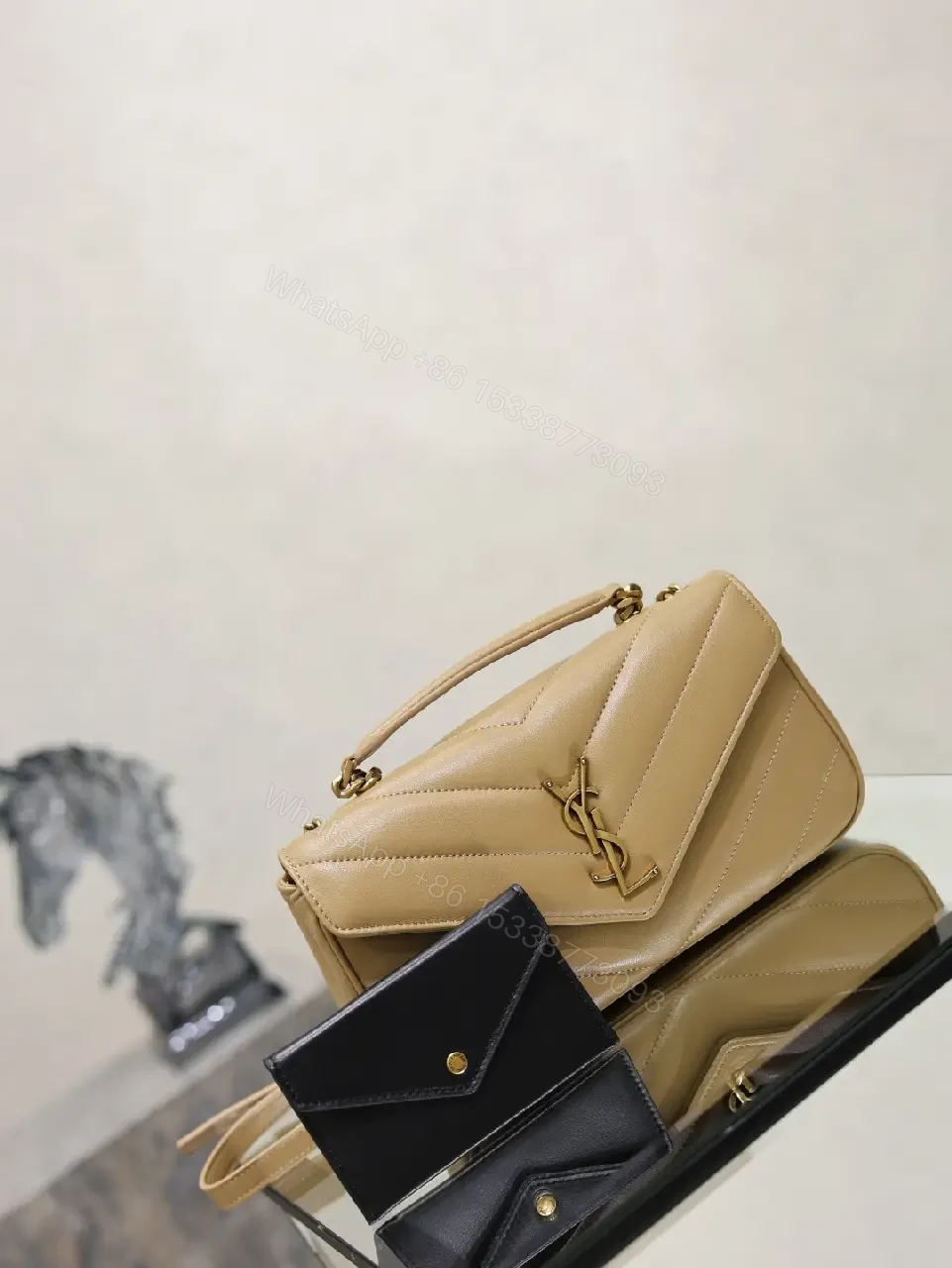 View 10 of Beige Leather Structured Top-Handle Flap Bag with YSL Logo