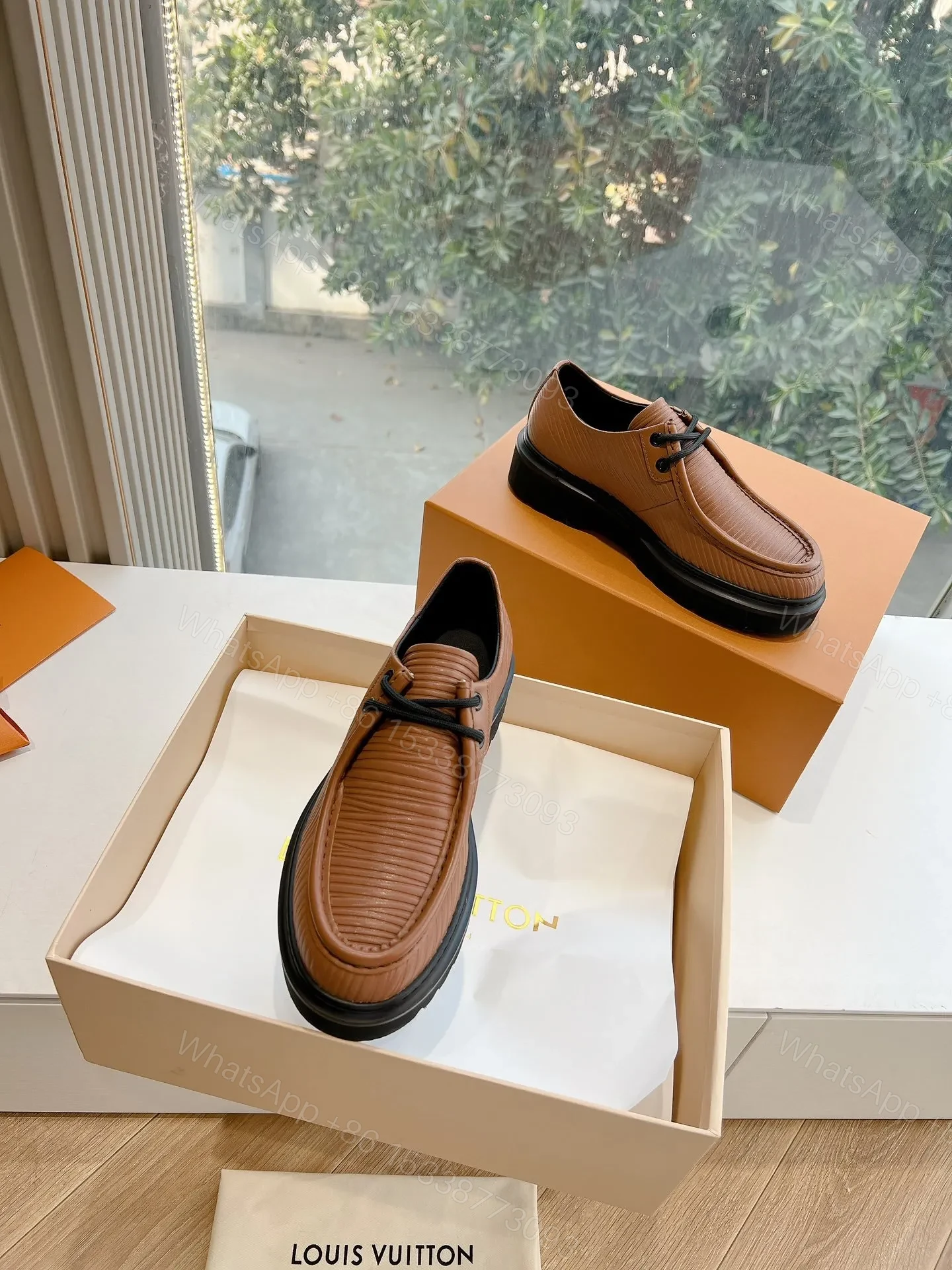 View 4 of LV Women Brown Textured Leather Loafers