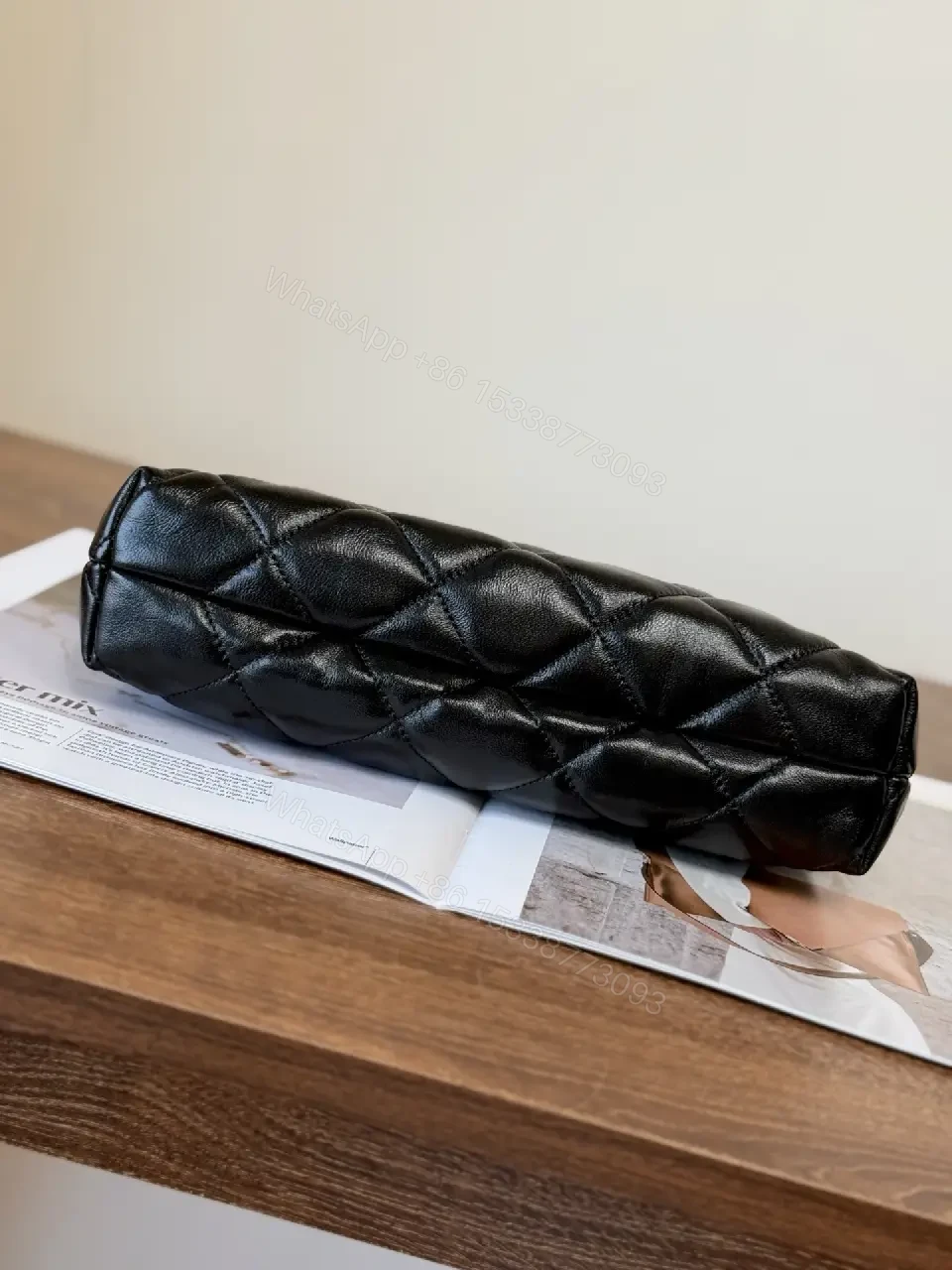 View 2 of Quilted Crossbody with Gold Emblem: Compact Luxury Bag
