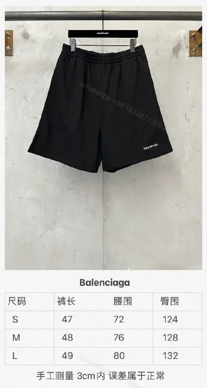 View 9 of black nylon shorts with logo motif for luxury everyday wear