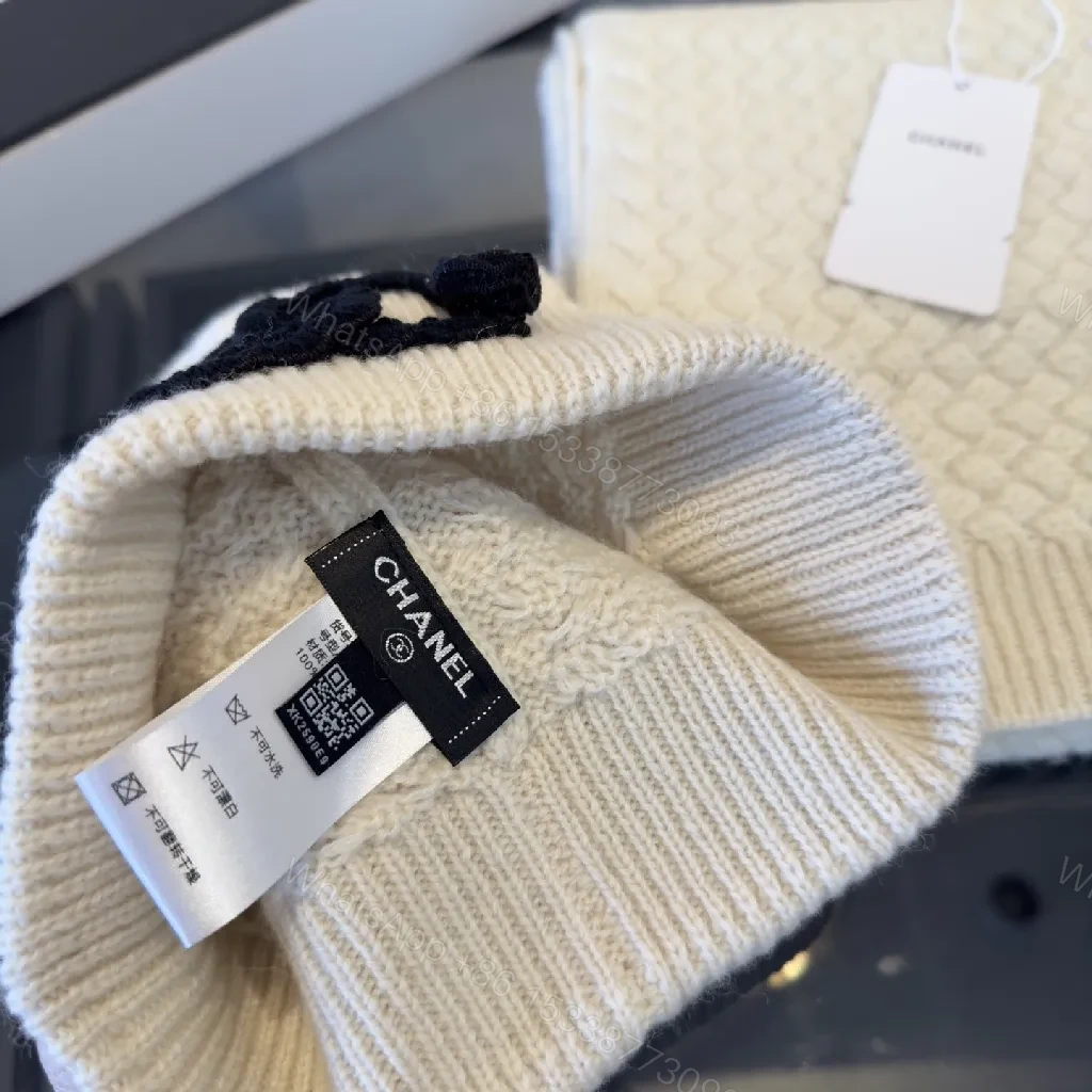 View 11 of Ivory Knit Set: Textured Luxury with Iconic Emblem