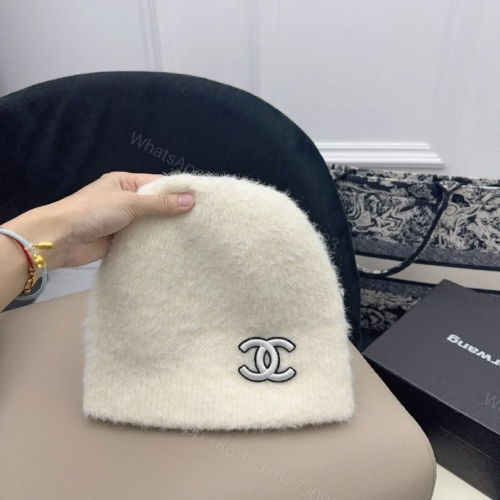 View 9 of Ivory Plush Handwarmer: Luxe Logo-Embossed, Lightweight Warmth