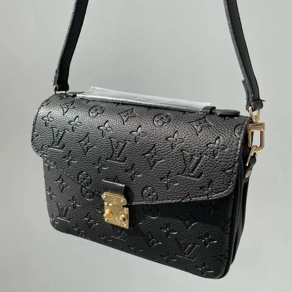 View 5 of Louis Vuitton Pochette Métis Monogram Empreinte Black 25Cm M41487