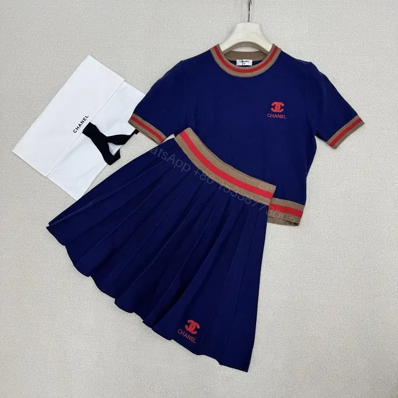 Navy Knit Set: Pleated Midi Skirt & Striped-Detail Top — view 1