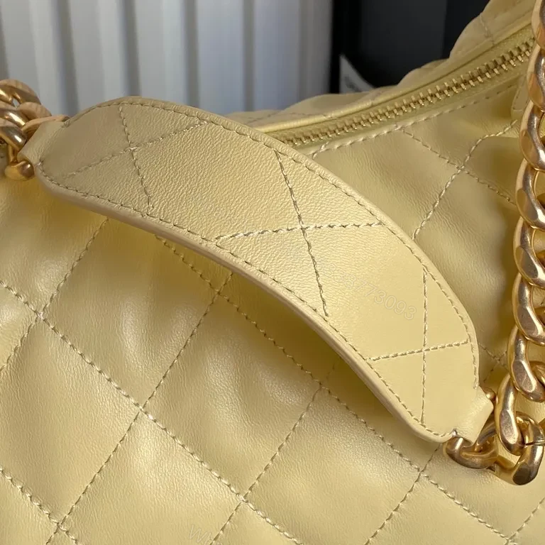 View 4 of Chic Quilted Weekender Bag in Soft Yellow with Gold Chain Handles