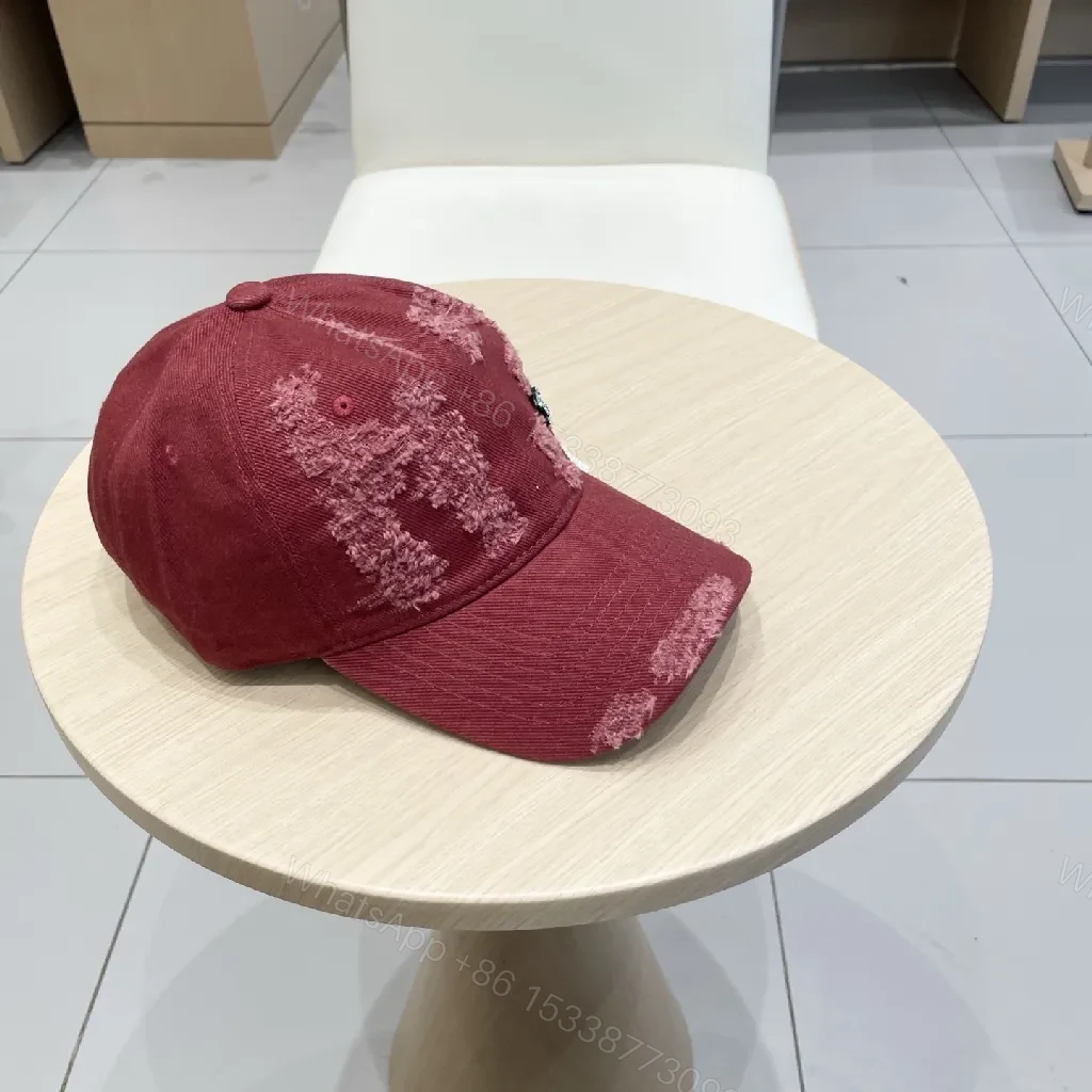 View 9 of Distressed Burgundy Cap: Luxe Texture, Subtle Logo, Everyday Wear