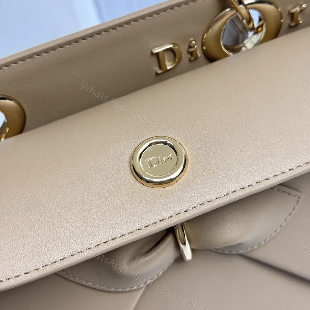 View 3 of Geometric Leather Mini Bag: Chic Bow Accent, Gold Hardware