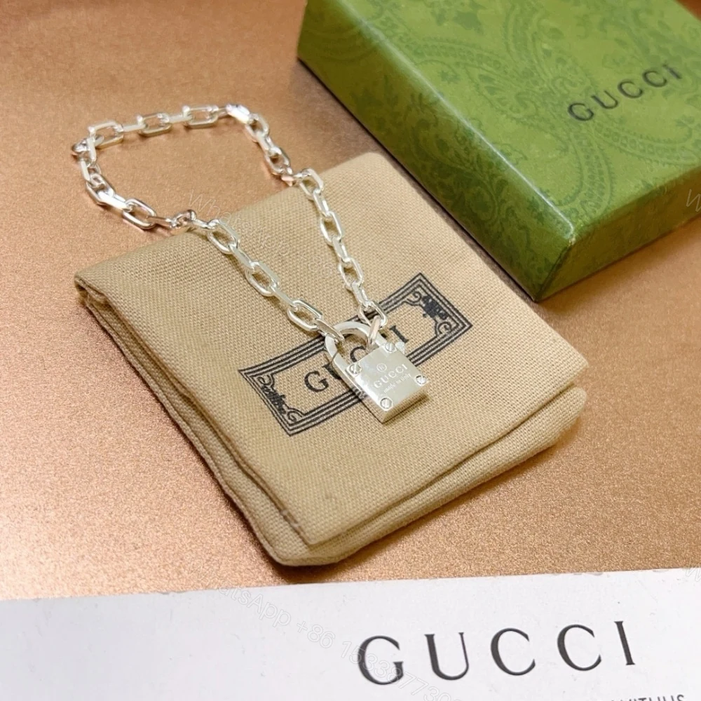 View 4 of GUCCI TRADEMARK SILVER CHAIN ​​BRACELET WITH PADLOCK