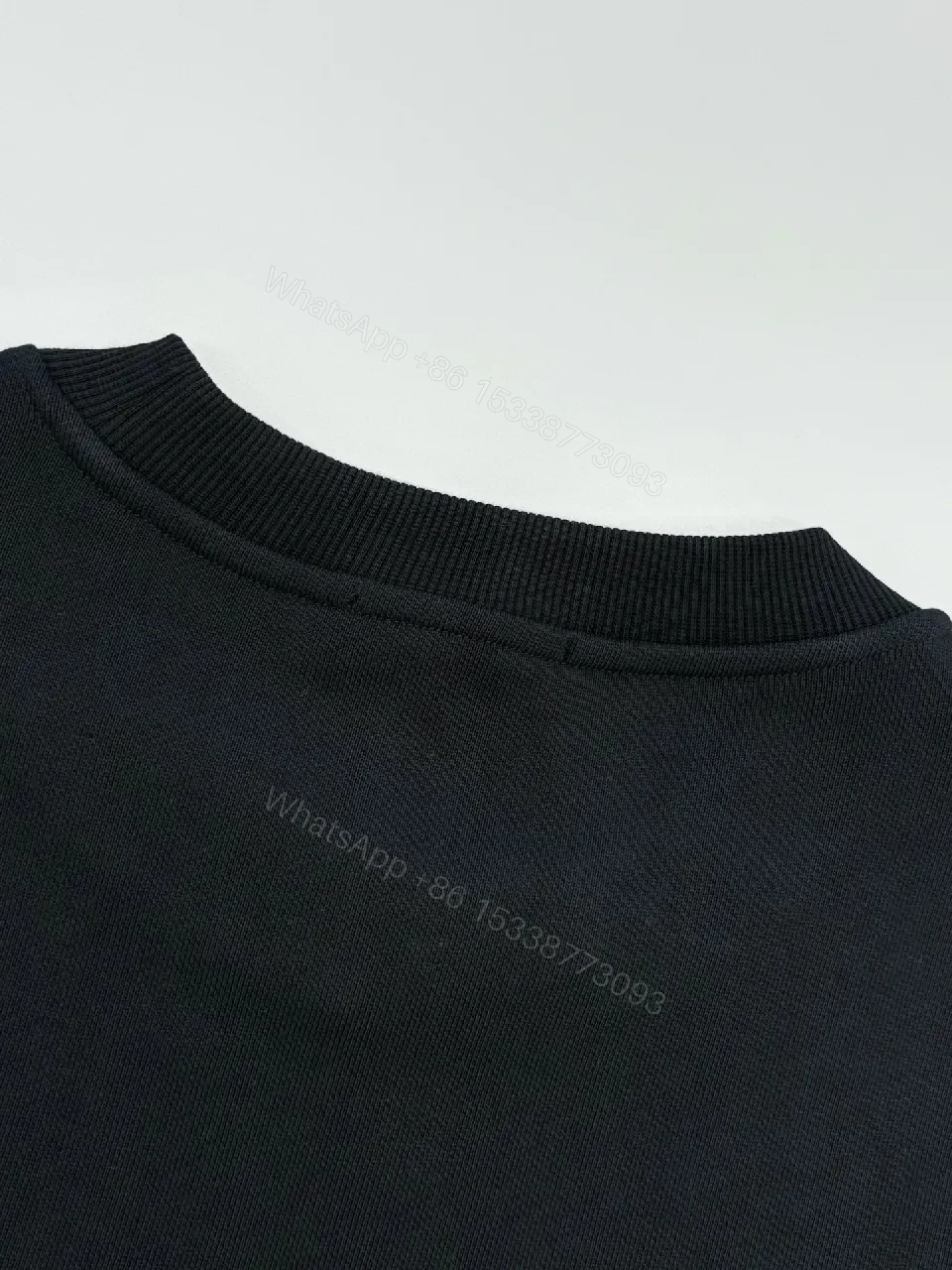 View 9 of Subtle Black Fleece Logo Sweatshirt, Luxe Casual
