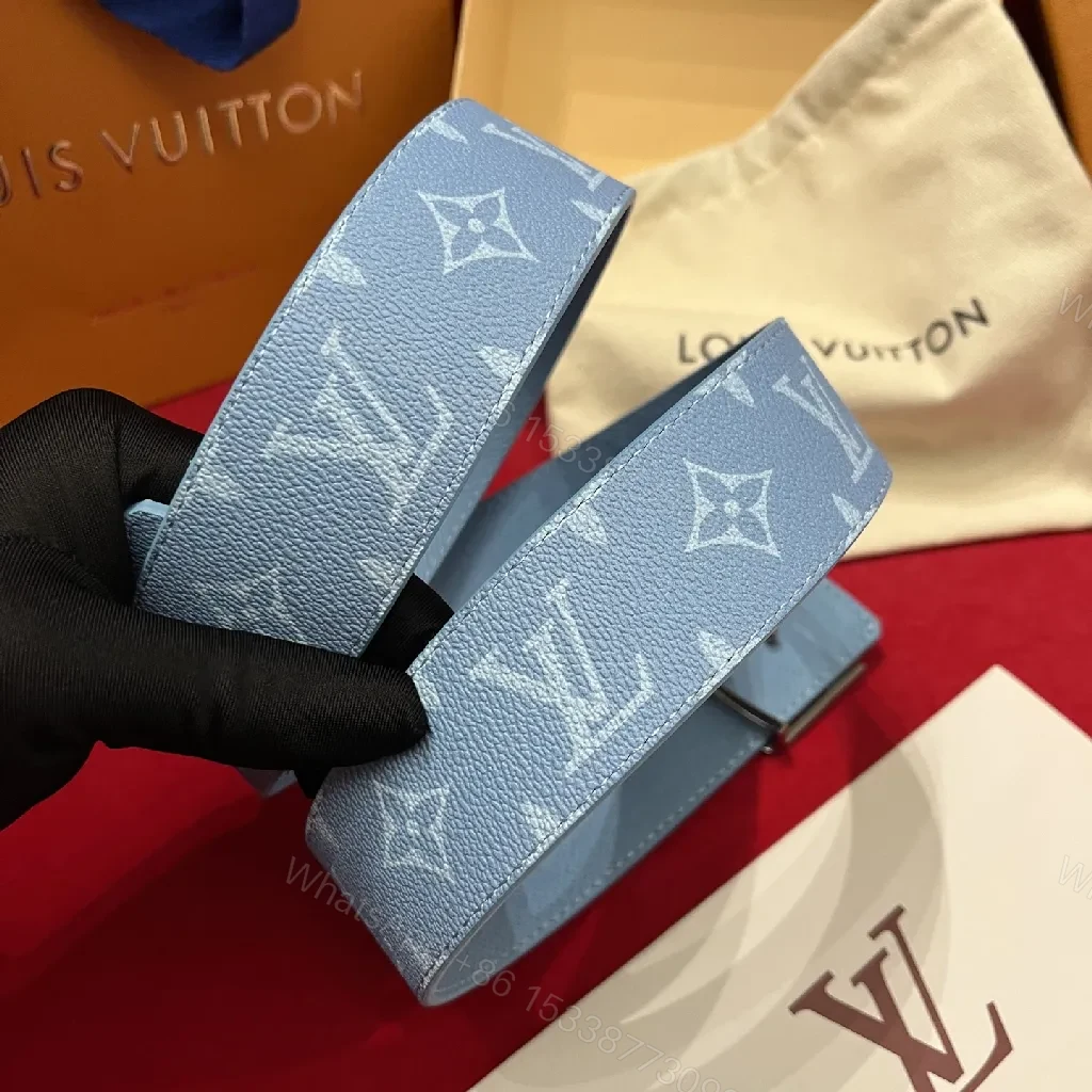 View 3 of Light-Blue Pebbled Leather Belt with Monogram Detail