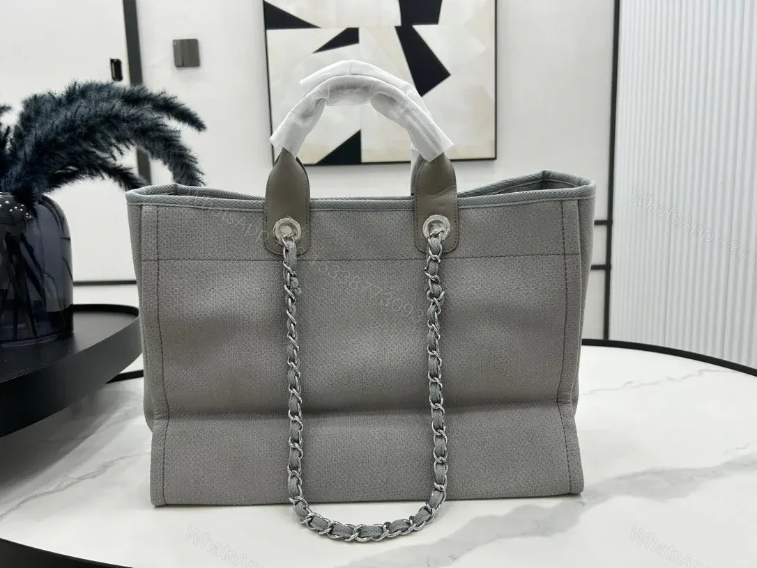 View 8 of CHANEL CC DEAUVILLE LARGE 38 TOTE BAG IN GREY CANVAS WITH WHITE LOGO