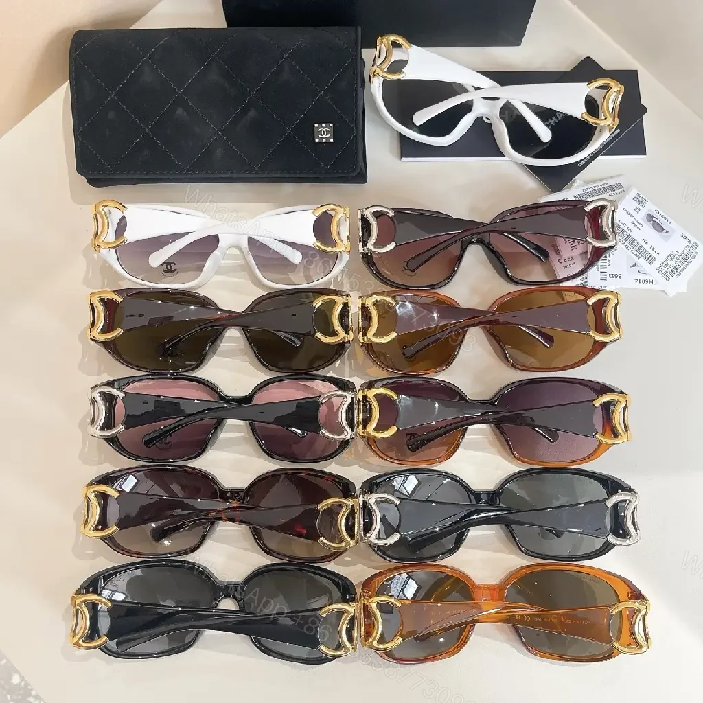 View 5 of Oversized Black Luxury Sunglasses with Gold Logo Details
