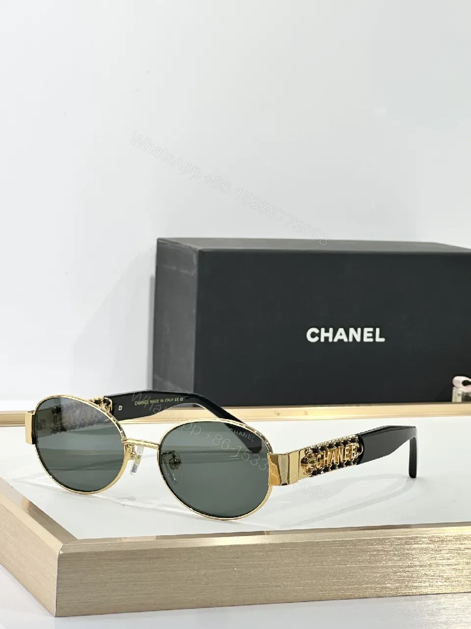 View 6 of Gold-Accented Round Sunglasses: Minimal Luxury Shield