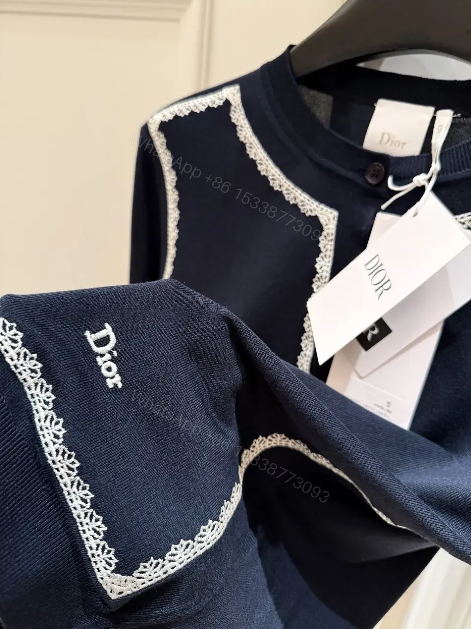 View 8 of Navy Knit Cardigan: White Piping, Modern Contrast, All-Day Comfort