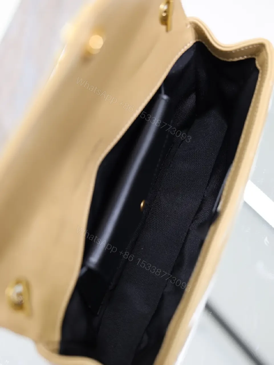 View 8 of Beige Leather Structured Top-Handle Flap Bag with YSL Logo