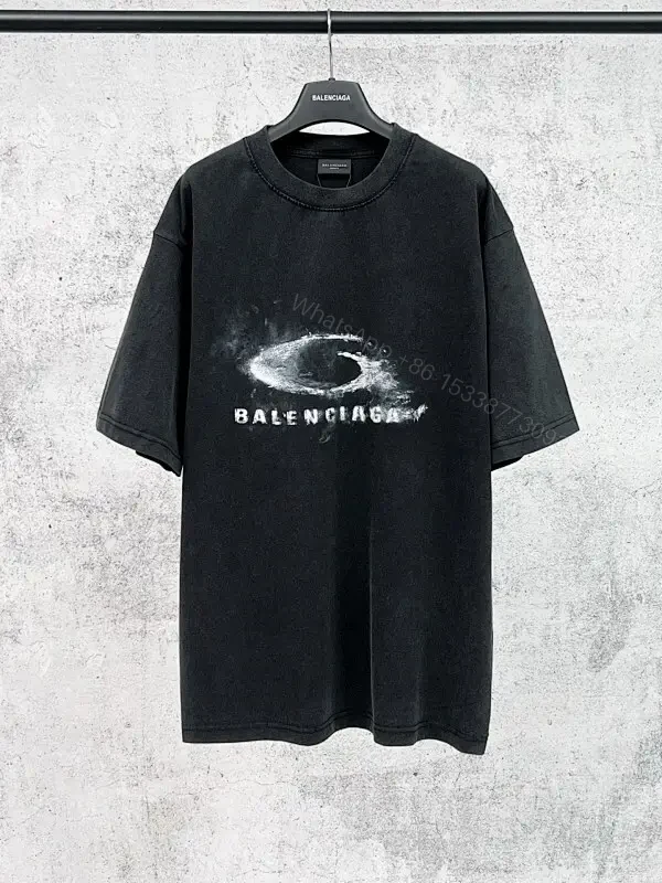Oversized Black Cotton Tee with Distressed Logo – Avant-Garde Streetwear — view 1