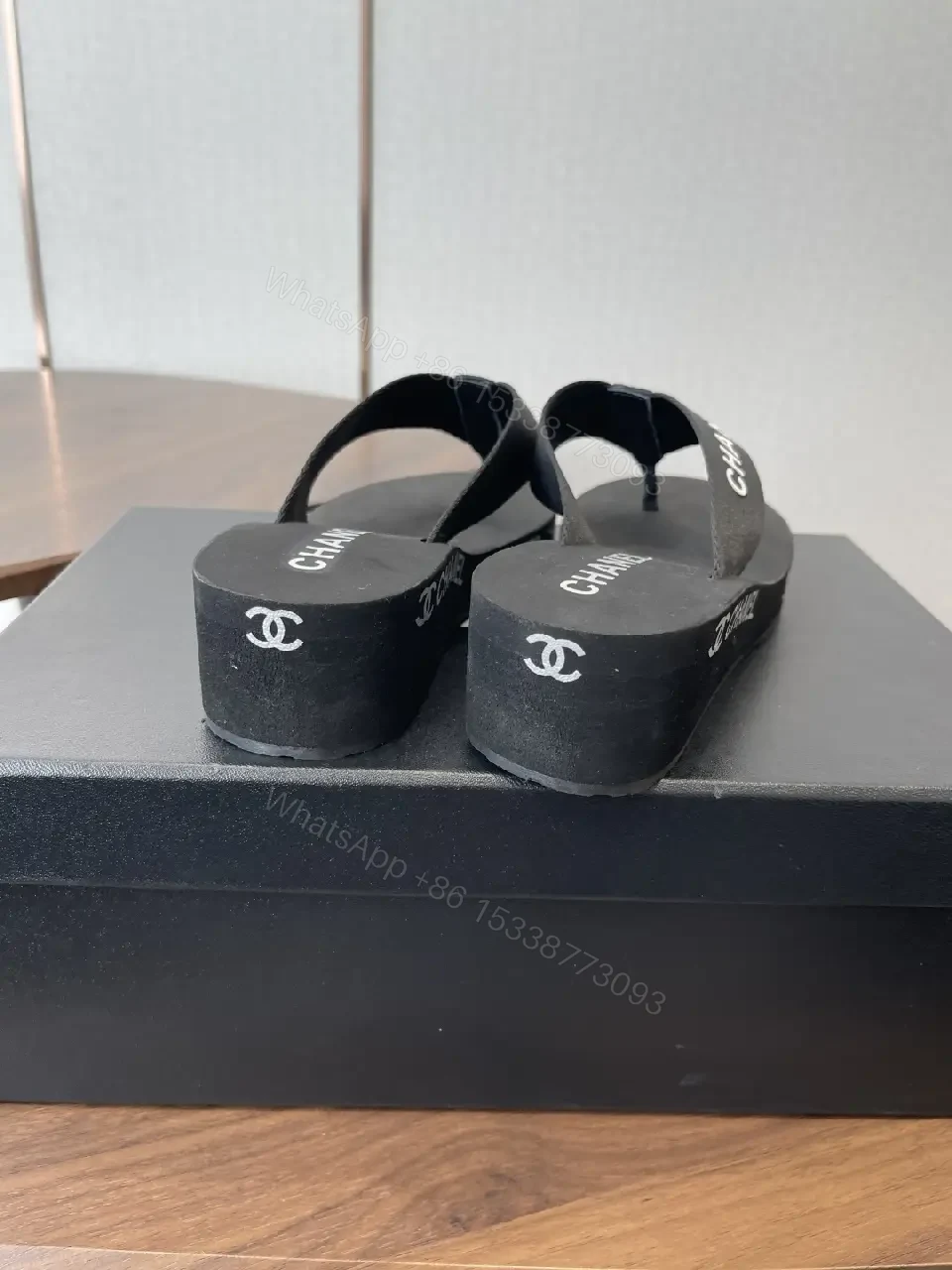 View 3 of Minimalist Black Luxe: Couture-Inspired Flip-Flops with Subtle Logo