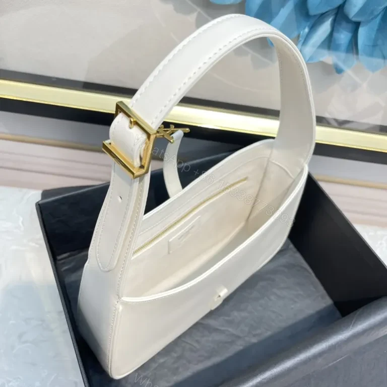 View 3 of Minimalist White Leather Handbag with Gold YSL Accent