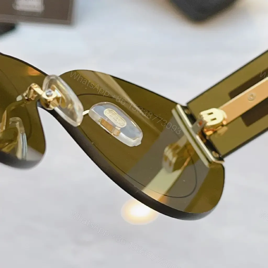 View 9 of Sculpted Round Sunglasses: Bold Hardware Luxe Eyewear