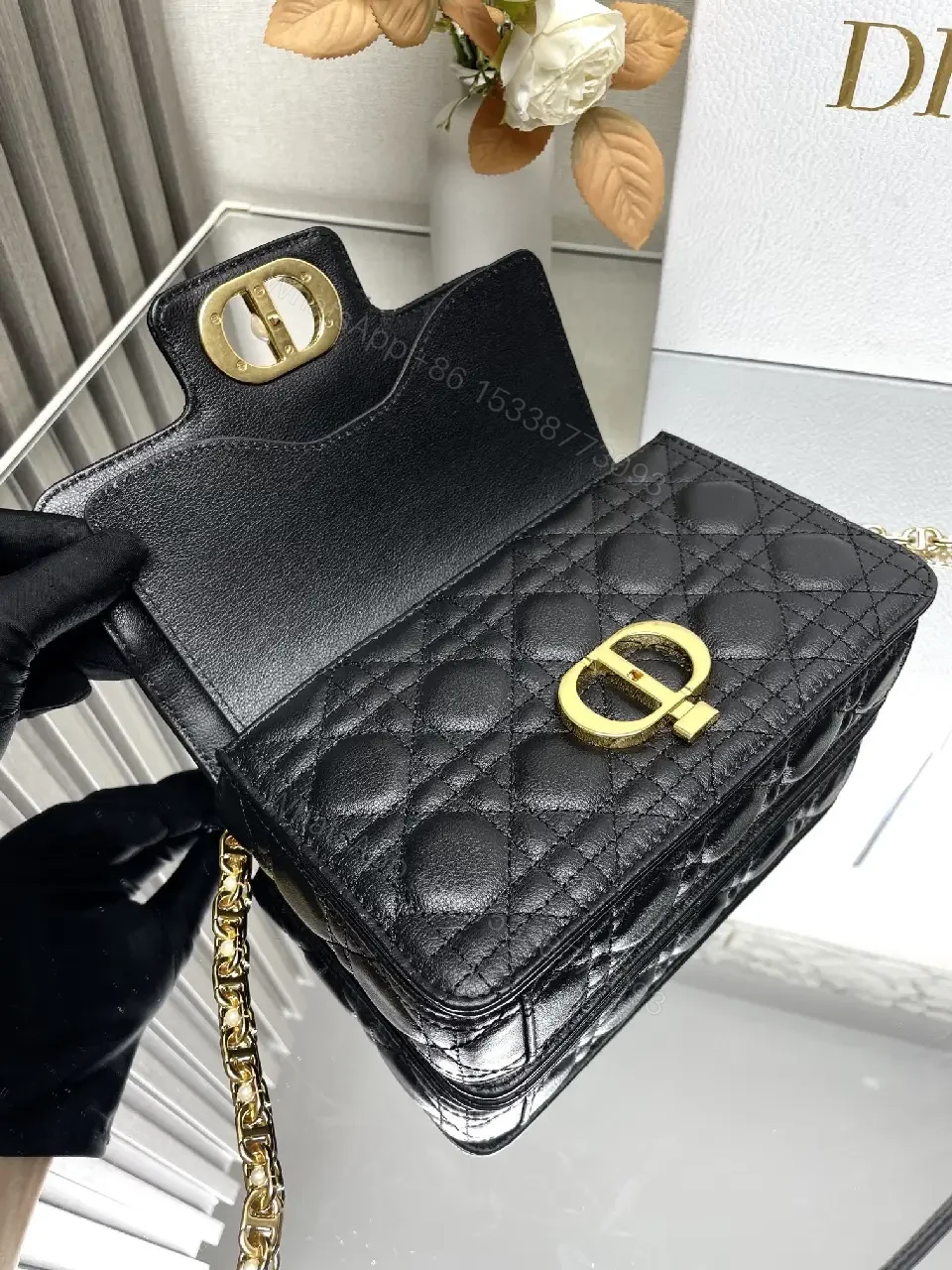 View 4 of Quilted Black Crossbody with Gold Chain: Modern Luxury Bag