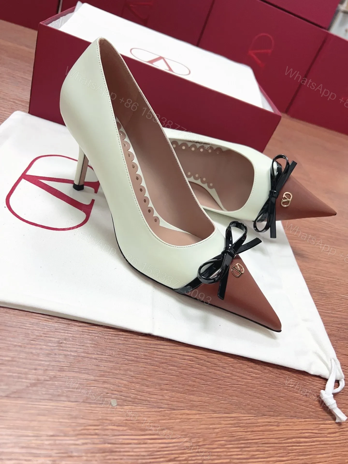 View 3 of Valentino Women White Leather Brown Bow Detail Pumps