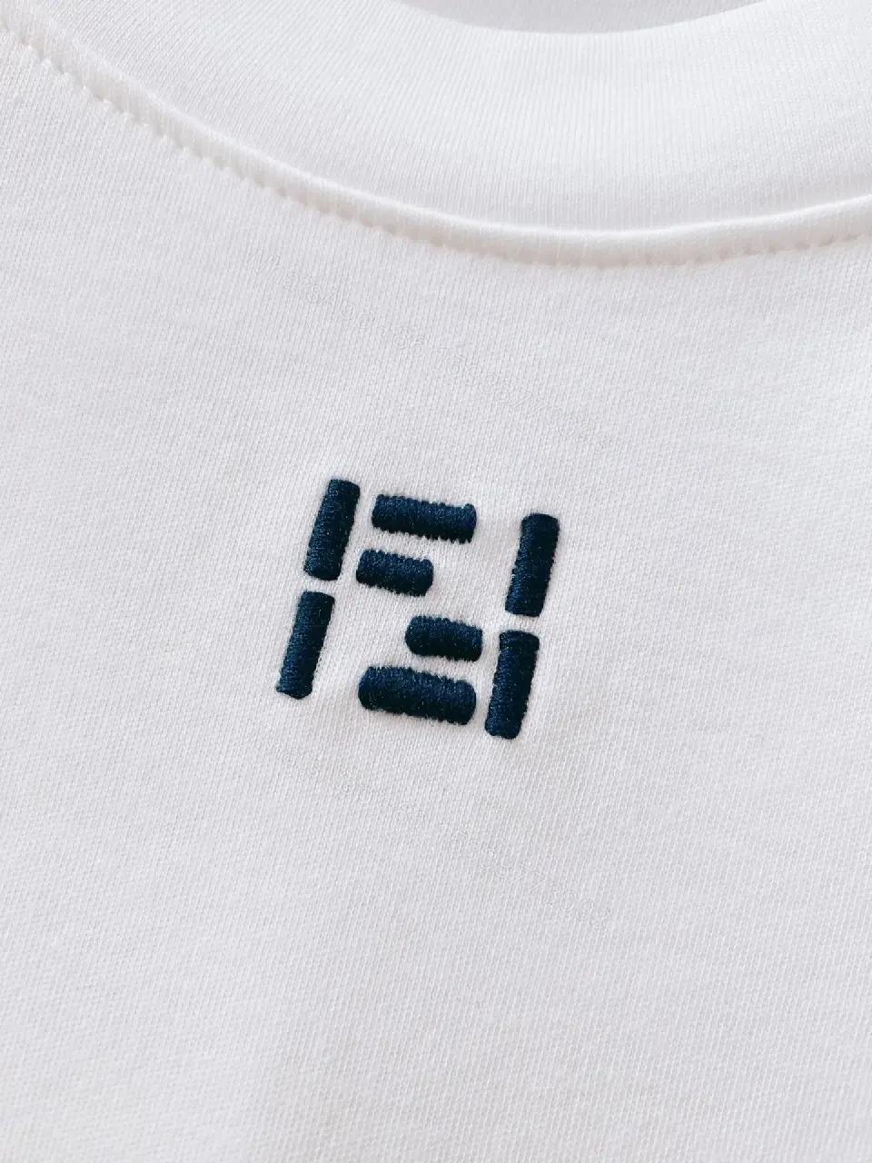 View 10 of Minimalist White Cotton Tee with Subtle Luxury Detail