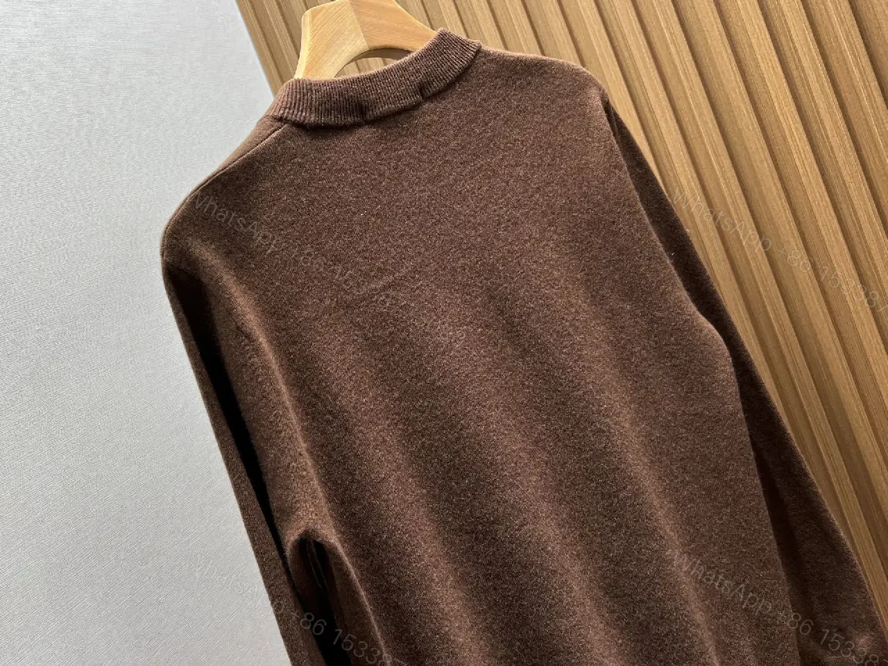 View 4 of Rich Cocoa Knit Sweater in Marled Texture with Crest Embroidery