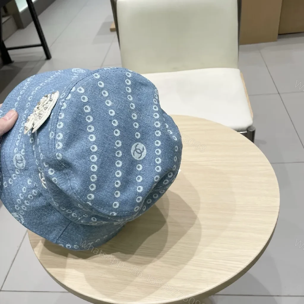 View 7 of Denim-Threaded Bucket Hat with Emblem: Bold, All-Season Style