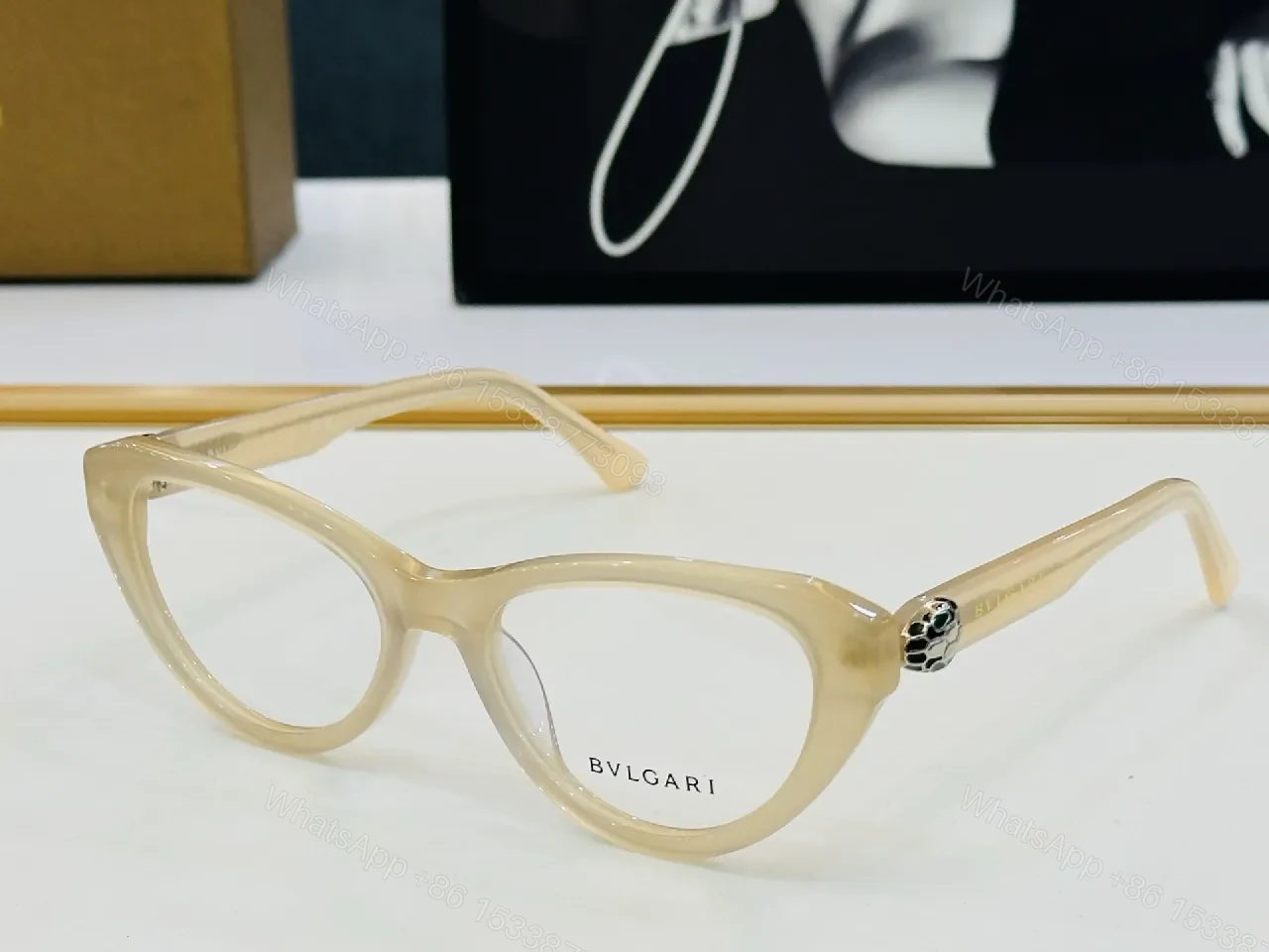 View 6 of Bold Cat-Eye Black Frames with Gold-Accent Sunglasses