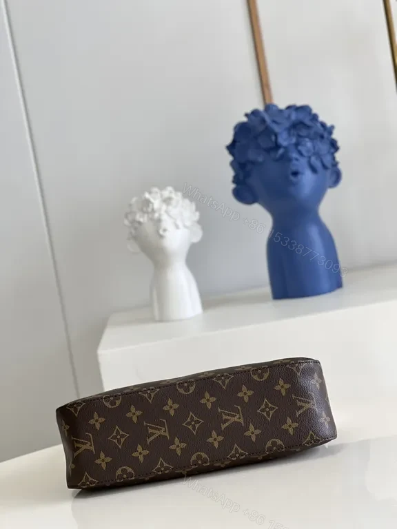 View 4 of Louis Vuitton Monogram Top-Handle Bag: Compact Luxury for Day to Night